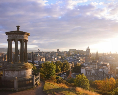 Edinburgh cityscape with calton hill monument at sunrise